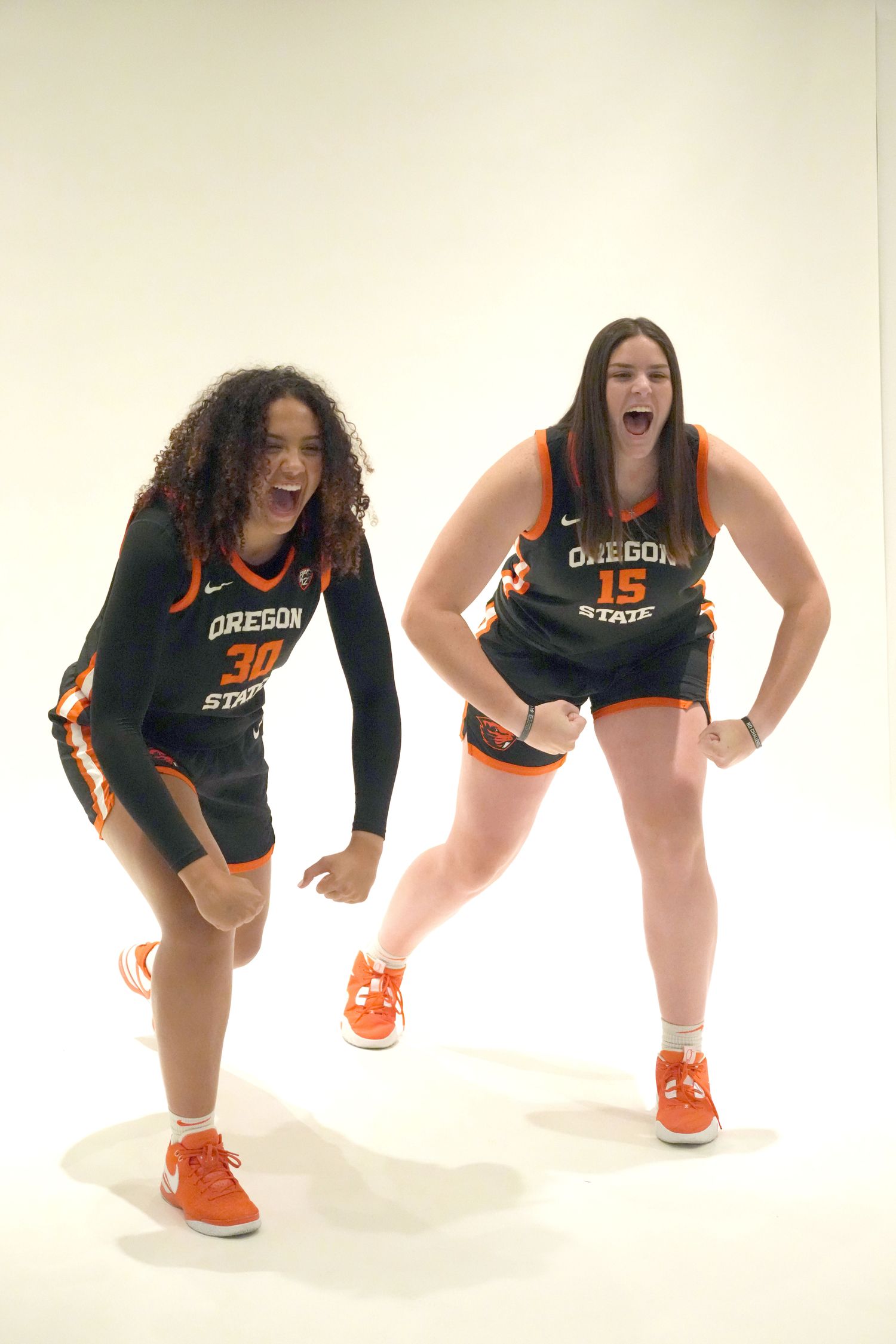 Oct 10, 2023; Las Vegas, NV, USA; Oregon State Beavers forwards Raegan Beers (15) and Timea Gardiner (30) pose during Pac-12 women's basketball media day at Park MGM Las Vegas Conference Center. Mandatory Credit: Kirby Lee-USA TODAY Sports